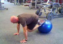 to the starting position Stability Ball Jackknife Place your feet on the ball and hands on the floor, slightly wider than