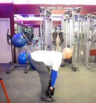Bend your knees slightly, and keep knees bent, back flat, head up, shoulders back, chest out and arms straight. Keep the dumbbells as close to your thighs and shins as possible.