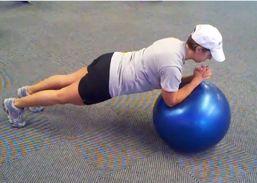 Workout A Stability Ball Plank Brace your abs. Put your elbows on the bench and rest your shins on the ball.
