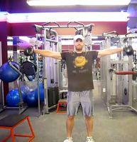 Workout D Iron Cross Hold a pair of dumbbells extended out
