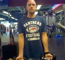 position as prescribed DB Curl Stand and hold dumbbells at
