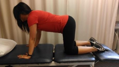 E. Quadruped hip extension: Patient is instructed to begin on all fours with