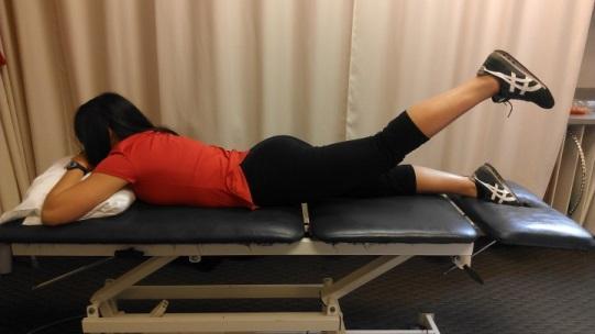 H. Prone Hip Extension: Patient is lying on stomach with both knees extended. Then, tighten muscle on front of thigh to maintain a straight leg.