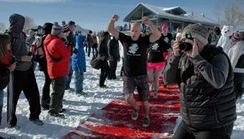 The American Cancer Society s annual Boulder Polar Plunge was first held on New Year s Day in 1982 and hosts hundreds of spectators bearing witness to hundreds of brave individuals as they take the