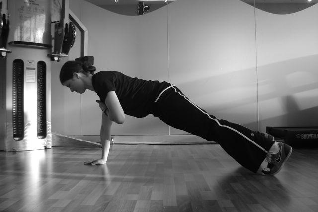 Focus on contracting the side abdominals on the side closest to the floor. Hold this position for the prescribed amount of time and repeat on the other side.