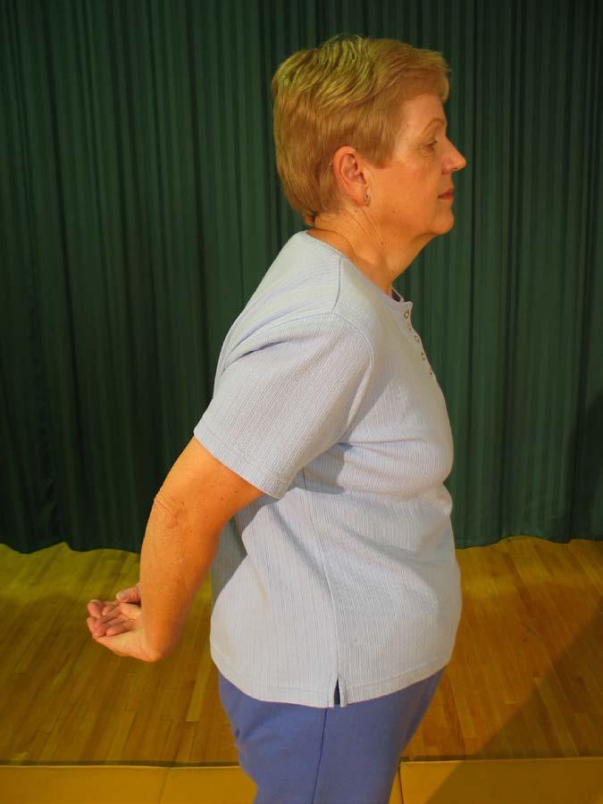 1 To stretch neck muscles: Sit straight. Turn head to left as far as it will go and hold six seconds.