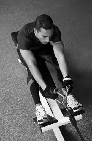 10 4 (a) Define the term respiration....[2] (b) A rowing machine is a piece of apparatus that is used in many fitness centres. Fig. 4.1 shows a man training on a rowing machine.