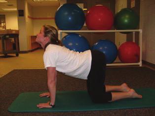 feet flat on table/ mat; pull the abs in and push your low back to the