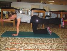 Prone Bridging on Elbows Lie on your stomach on a table or mat with your forearms/elbows on the table/mat; rise up so that you are resting on your forearms and toes; maintain abdominal draw