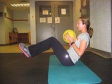 Tighten your hamstrings, glutes, and low back and lift your