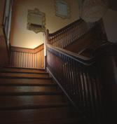 or wood flooring Unclear transition from last step to landing Poor lighting: dark shadows in