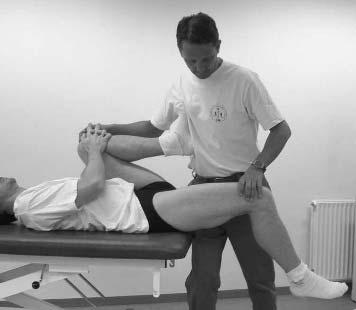 Groin pain 451 position by pressing the side of his/her trunk against the foot of the flexed leg.