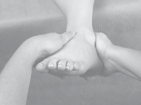 Grasp the navicular between your index finger and thumb of your contralateral hand, resting your other fingers and ulnar