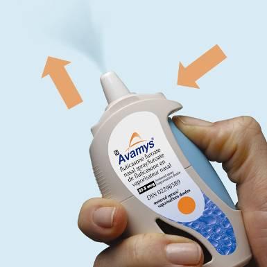 Hold the device with the nozzle pointing up and away from you. Firmly press the button on the side all the way in to release a spray through the nozzle.