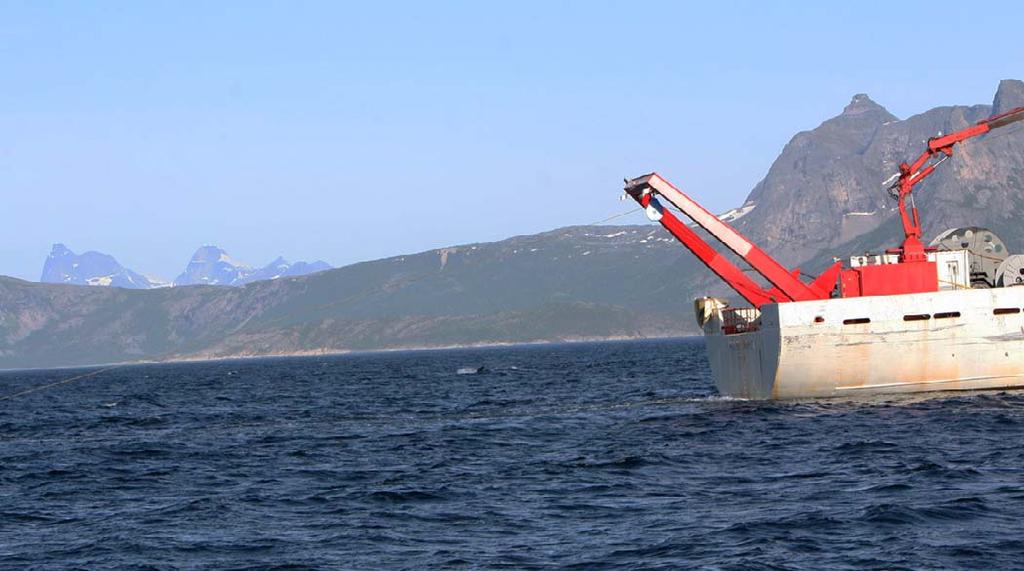 Figure (2). Left: The MS Strønstad shown with a VHF tracking array (top right) and towed hydrophone array. Visual observers were stationed on the flying bridge.
