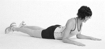 As you exhale press up by pushing through the arms to perform a sloppy push-up or a passive spinal extension.