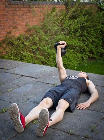 3. KETTLE BELL FLOOR PRESS 5 x 6-12 reps (per side) 60 seconds Push Up Lie on the ground with a kettle bell in one hand on one side of