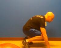 Burpees/X-Body Mountain Climber Combo Stand with your feet shoulder-width apart.