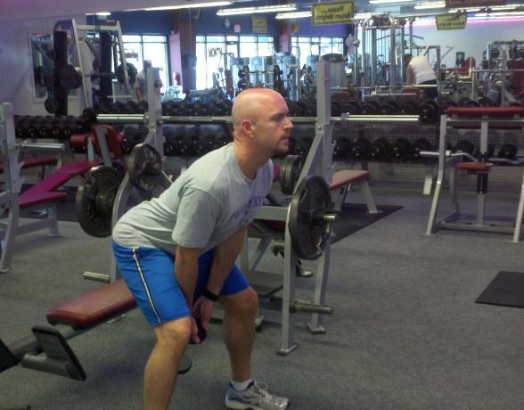 Workout B KB/DB Swings Stand with your feet wider than shoulder-width apart.