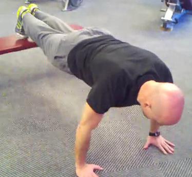 Workout F Plank (see above) Decline Pushup Keep the abs braced and body in a straight line from toes (knees) to shoulders.