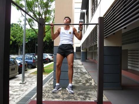 b. Pull Ups / Chin-Ups Hang from the bar with an overhand grasp (palm forward) with hands about