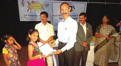 Mr Brown along with Dr Rao, released the Annual activity book of DBCEC for 2014.