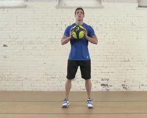 . Start with your legs apart, holding the med ball at chest height.. Squat so your knees are at least 90 degrees.
