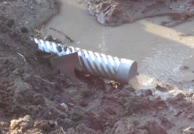 Flooding of the west abutment After the abutments were backfilled and compacted to the design elevation, ISU researchers performed DCP and light weight deflectometer (LWD) testing (shown in Figure