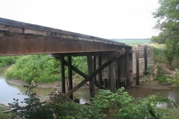 an 18 ft wide, 60 ft long two-span bridge originally constructed in 1970.