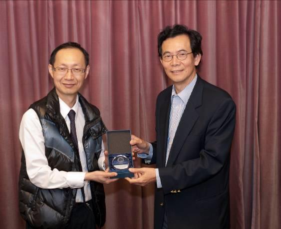 souvenir from Dr Joseph Chan Dr Edmond Pow (left) received