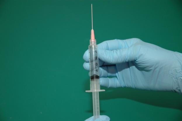 Attach needle to 5 ml syringe Aspirate