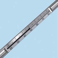 Slide the appropriate end of the measuring device over the Kirschner wire against the LCP drill sleeve and determine the proper screw