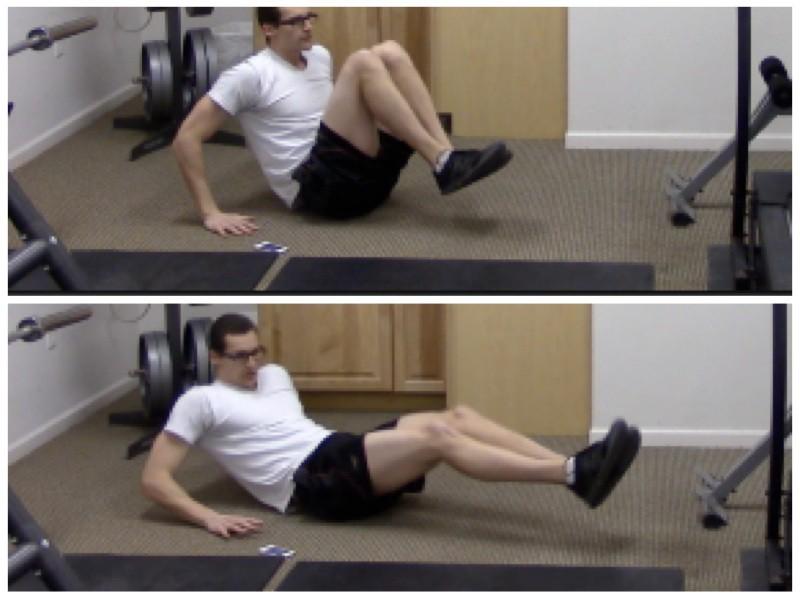 V-Ups 1. Start by placing your hands behind you for balance and knees slightly bent straight out in front of you. 2.