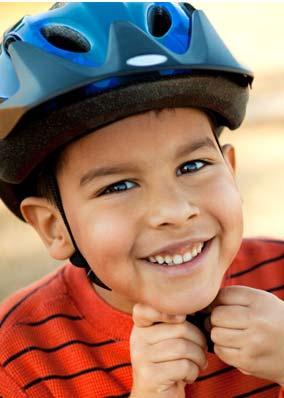 When should the bike helmet go on? A. Before they get on their bike B.