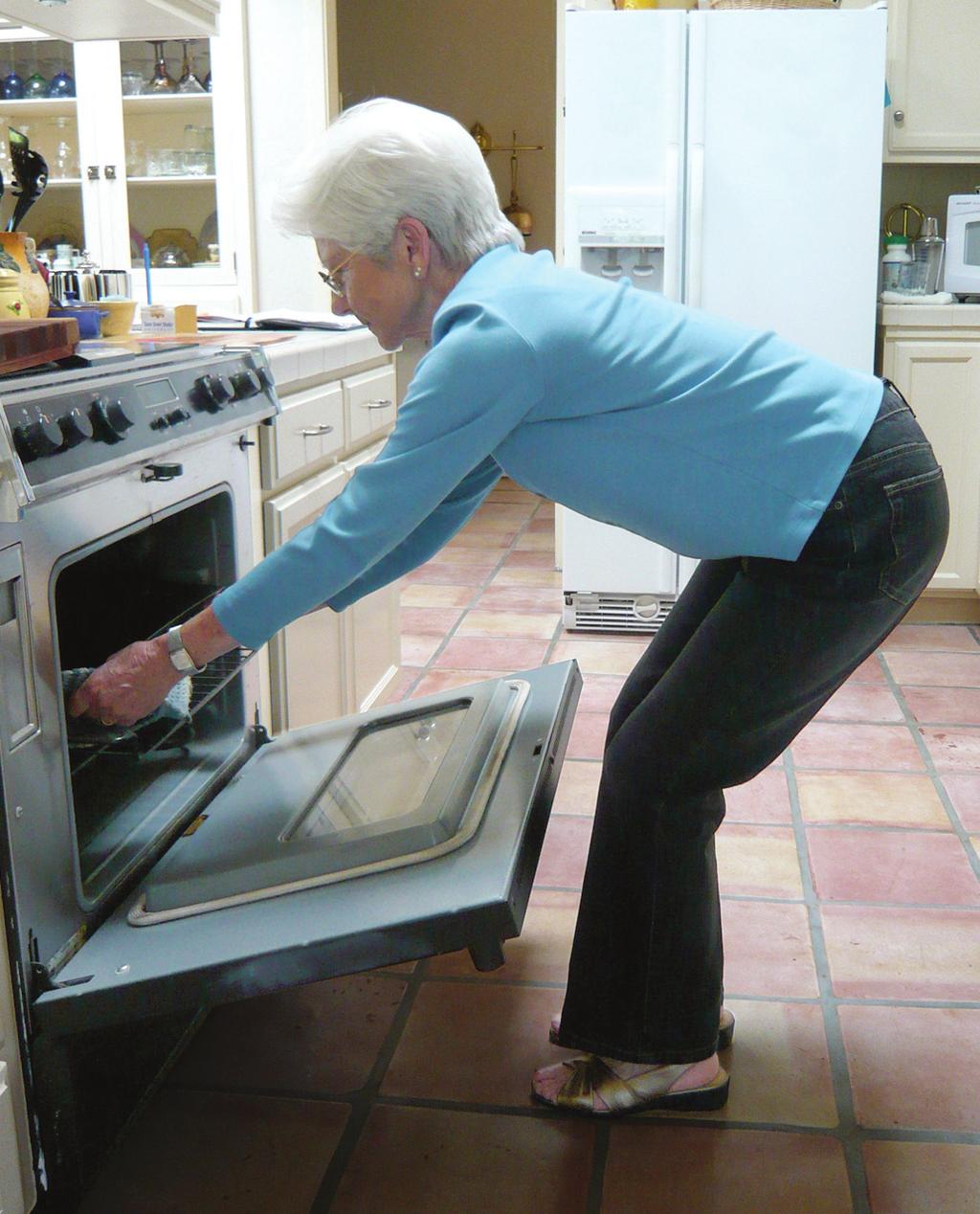 The Oven Keep spine lengthened and straight, chest lifted and knees bent.