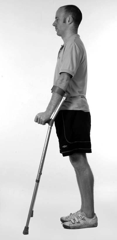 How to use elbow crutches Standing Place the crutches into the H position. Then place one hand onto both handles and stand up.