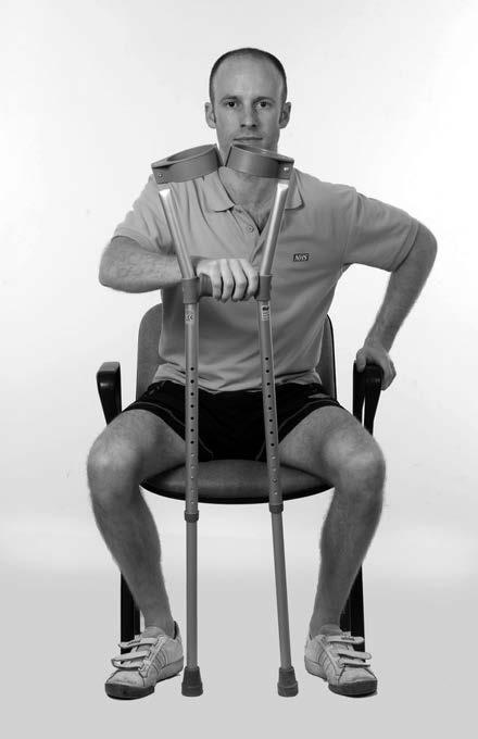 The safest standing position can be seen in the photograph. Each crutch should be slightly in front and out to the side of your feet, this increases stability when standing.