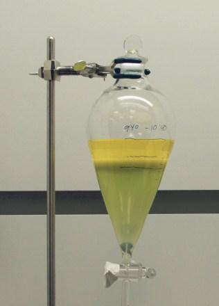 for the extraction process. The IPA enhances the mixing of the hexane with the water phase. The whole mixture was taken into a 1 liter funnel and shaken for several minutes until mixed well.