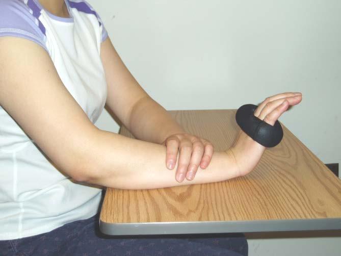 Stabilize your weaker arm with your stronger hand.