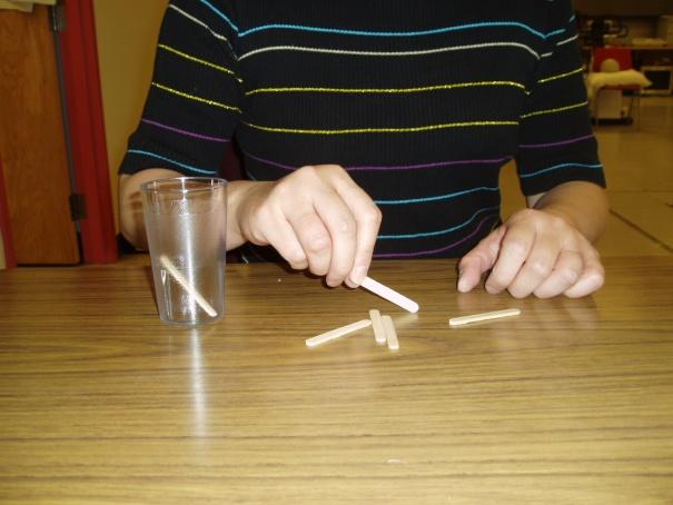 Pick up Sticks Put the sticks on the table. Using your weaker hand, take each stick and place in the cup.
