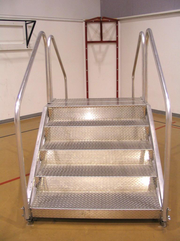 Comprised of five steps on either side, the officer runs up one side, down the other, rounds a cone and repeats the stair obstacle.