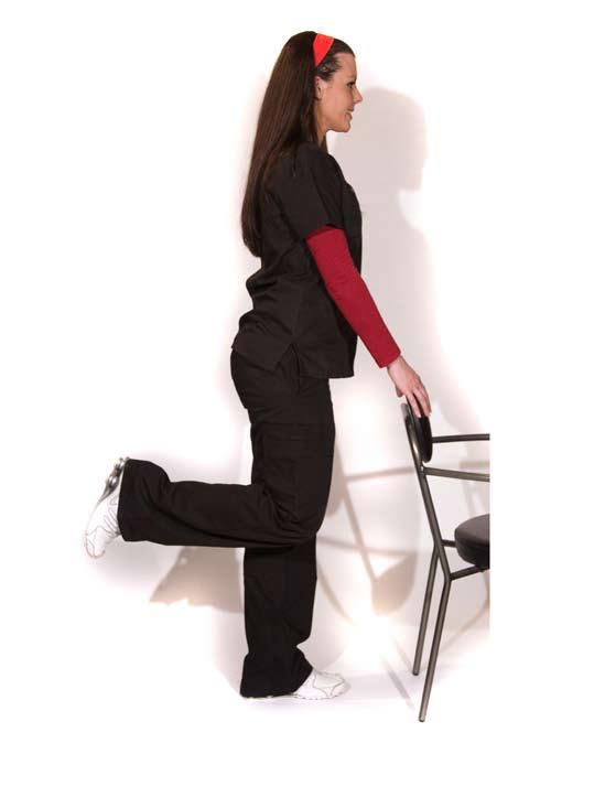 Home Exercise #12: Standing Knee Flexion Stand while holding on to a steady surface, such as a heavy chair or table.