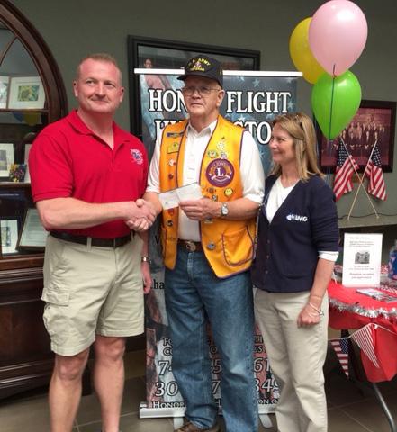 Milton Lions Club honors veterans Milton Lions Club President Dave Vititoe presented a check for $400 to Honor Flight Huntington to help send a group of veterans to Washington, D.C. to visit the memorials.