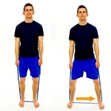 standing position. This may also be performed up against the wall for balance support.