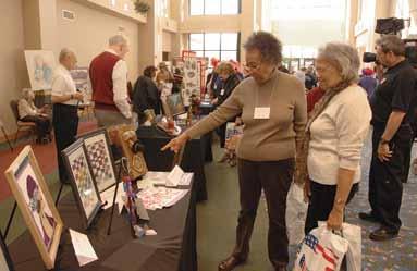 Top right: 2007 Art of Aging Successfully attendees discuss art on display.