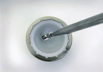 Surgical Technique 15 Polyethylene Liner Removal (Bone Screw Method) Locate a 3.2mm or 3.5mm drill bit included in the Screw Kit.