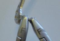always face upward («UP») when inserting the plate into the bending pliers.