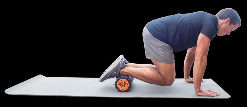Start on your hands with the foam roller placed slightly lower than your knee.