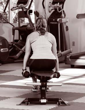Press the dumbbells upward until your arms are extended overhead and lower back to the sides of your shoulders to finish the movement.