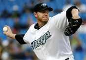 Halladay throws during first inning AL action against